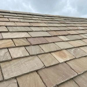 Mayan Armoured Stone lightweight natural limestone roofing tiles with fire-resistant GRP backing and waterproof design